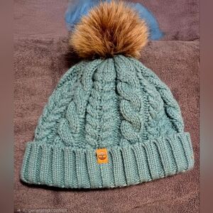 Timberland Blue Cable Knit Beanie with Brown Pom-Pom